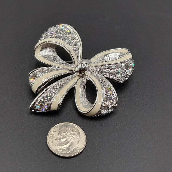 Vintage Nolan Miller Bow Brooch Rhodium Plated Clear Rhinestone White Enamel - Picture 11 of 11